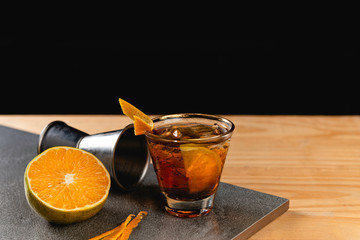 Rabo de Galo Cocktails on stone background in gray color. Brazilian Drink.