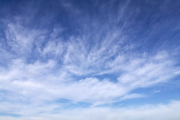 Bright blue sky with cirrus clouds in the winter morning