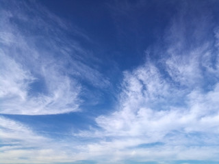 Bright blue sky with cirrus clouds in the winter morning
