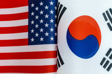fragments of the national flags of the United States and South Korea close-up concept