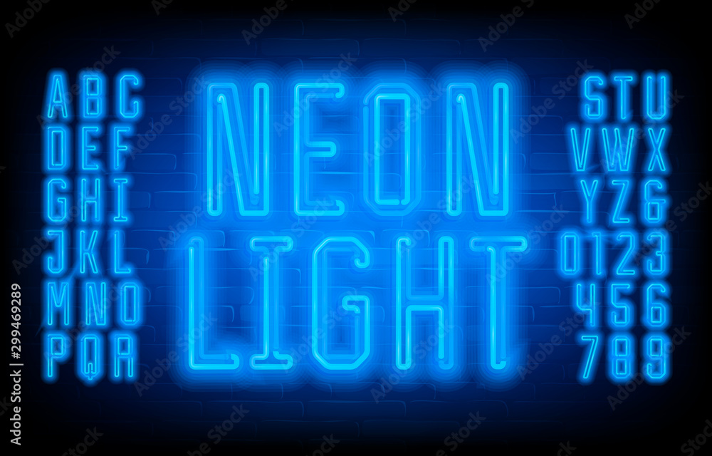 Fototapete neon light alphabet font. geometric condensed letters, numbers and symbols on brick wall background.