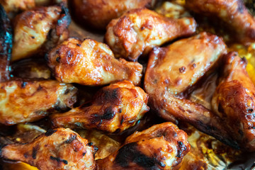 Close up image Grilled chicken wings and legs on  table, Top view.