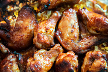 Close up image Grilled chicken wings and legs on  table, Top view.