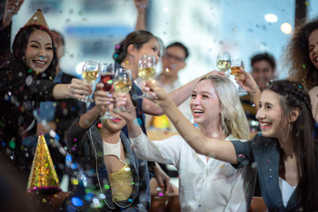 Business people drink wine At a party celebrating business success