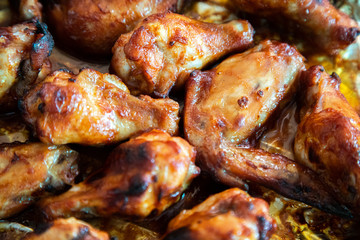 Close up image Grilled chicken wings and legs on  table, Top view.