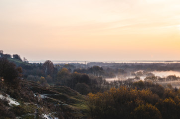 Clay hills at dawn. Landscape holiday in the village.