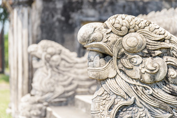 Beautiful stone sculptures of dragons at the Imperial City, Hue
