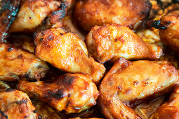 Close up image Grilled chicken wings and legs on  table, Top view.
