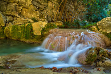 Fototapeta na wymiar Waterfall green forest river stream
