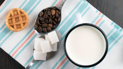 cup of coffee with milk and cookies