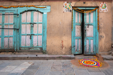 Fototapeta na wymiar Rangoli before a Doorway