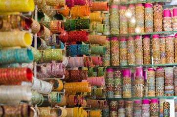 Glittering rows of colorful bangles in a beautiful arrangement for the festive season