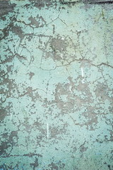 Old flaky blue painted wall, texture, closeup