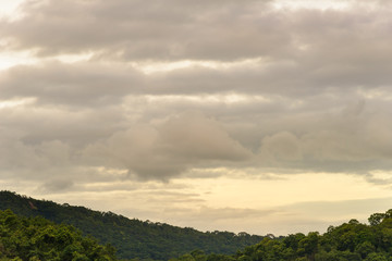 mountain landscape and meadows with cloudy and warm light in nature
