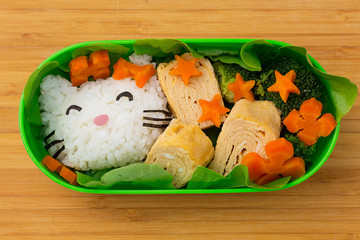 Japanese food with beautiful decor on wooden background