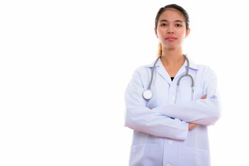 Fototapeta premium Portrait of young Asian woman doctor against white background