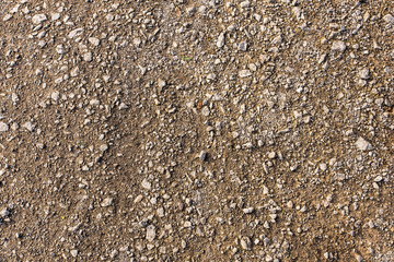 textured gravel background, brown stones