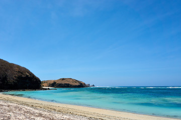 Obraz premium LOMBOK, INDONESIA - September.10.2019: Empty beach at kuta beach, Lombok, Indonesia.