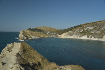 View over Lulworth Cove rock formations and strata on the Dorset coast