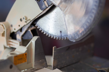 Close-up shots of a circular saw. Joiner tools on a workbench in an apartment