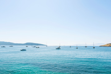 Nice view of the sea. Sunny bright day yachts are anchored in the bay. Aegean Sea Bodrum Turkey.