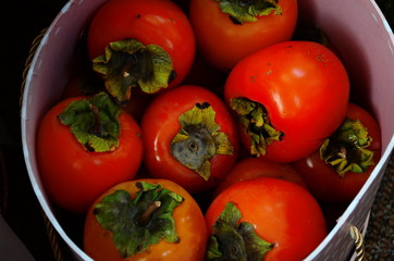 Fresh Ripe Persimmon Fruits Ready to Eat.