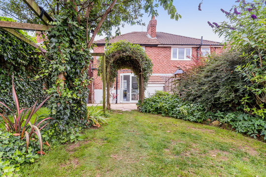 Back Garden Of Suburban Semi Detached House England Uk