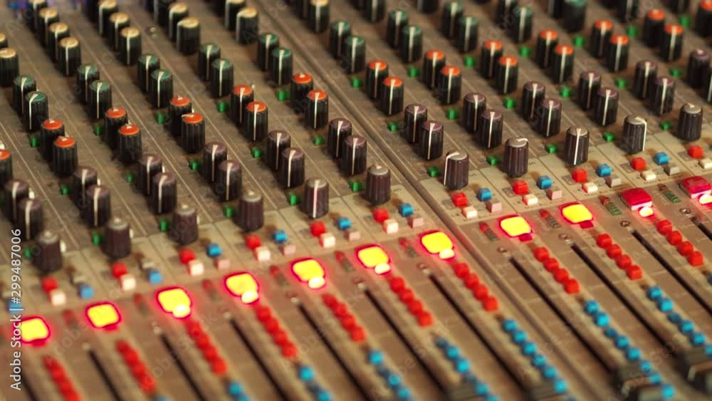 Poster professional audio mixing console, mixer. pro audio mixing board faders and knobs. static shot of mu