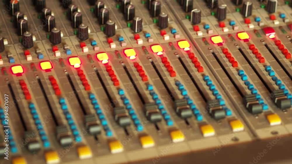 Poster professional audio mixing console, mixer. pro audio mixing board faders and knobs. static shot of mu