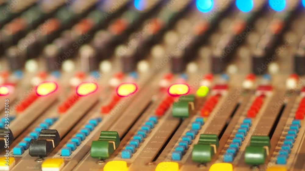 Poster professional audio mixing console, mixer. pro audio mixing board faders and knobs. static shot of mu