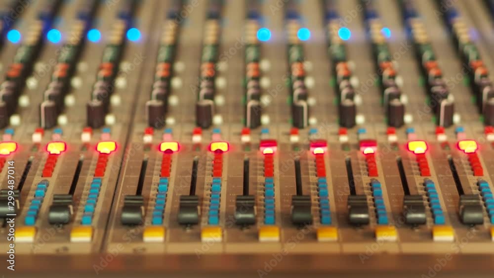 Poster professional audio mixing console, mixer. pro audio mixing board faders and knobs. static shot of mu