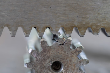 Macro of  gear drive shaft and rack with broken teeth