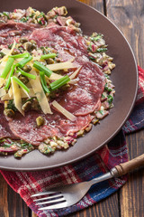 Beef carpaccio with arugula and parmesan