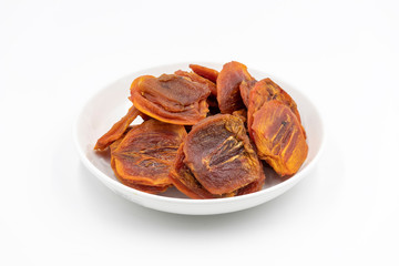Dry persimmon on white background