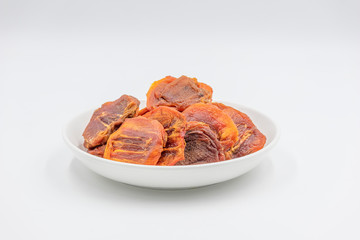 Dry persimmon on white background