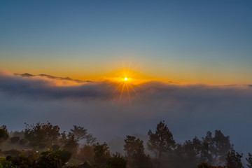 A landscape view of beautiful sunrise with sea of clouds from top of the Mountain, South Korea.