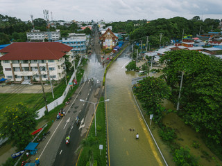 Fototapeta na wymiar High-angle view of the Great Flood, Meng District, Ubon Ratchathani Province, Thailand, on September 10, 2019, is a photograph from real flooding. With a slight color adjustment