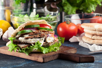 Doner kebab - fried minced meat  in pita bread