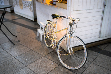 Bicycle in Christmas lights in Vilnius