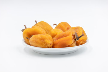Dry hoshigaki persimmon on white