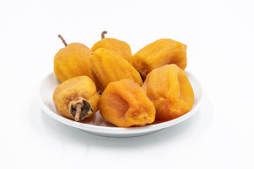 Dry hoshigaki persimmon on white