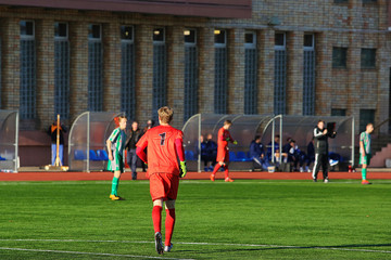 Soccer player stay in field
