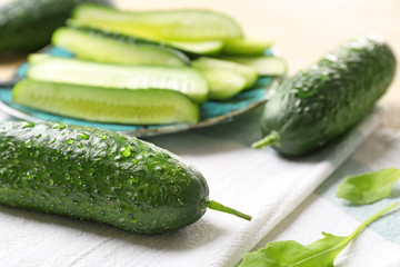 Fresh green cucumbers on table, closeup