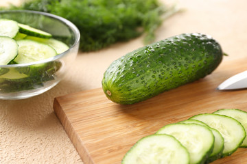 Fresh green cucumbers on table