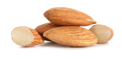 Tasty almonds on white background