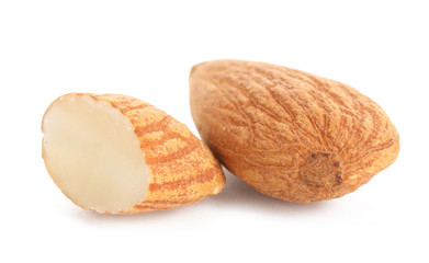 Tasty almonds on white background