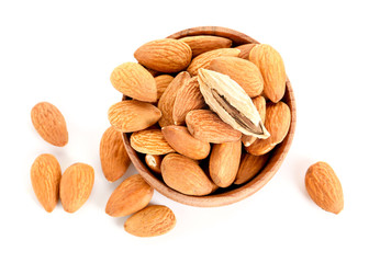 Bowl with tasty almonds on white background