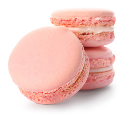 Tasty macarons on white background