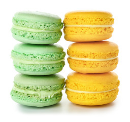 Tasty macarons on white background