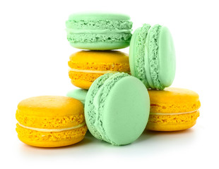 Tasty macarons on white background